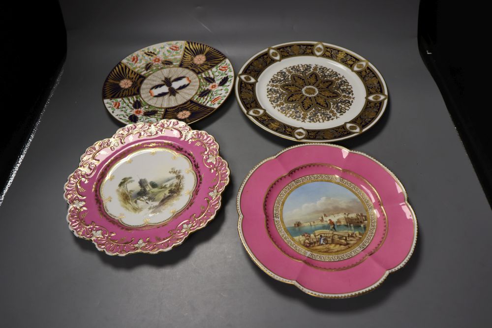 A late 19th century Wedgwood imari pattern plate, two 19th century pink bordered plates, and one other cabinet plate titled View near